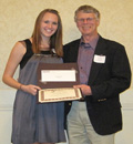 Kimberly Hall receives award from Dr. Brian Spooner