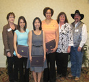Kaw Vally Rodeo Assoc presents to Pam Maynez, Anna Barriga, Elizabeth Riedy