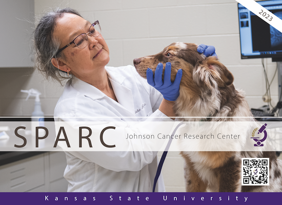 cover of the 2023 sparc magazine with a veterinarian and a dog