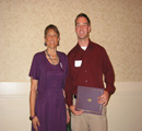 Bev Lueers presents award to Kyle Crow