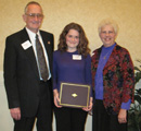 Anna Rogers receives award from Wayne & Nancy Cottril