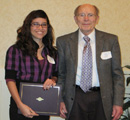 Paula Kurtz receives award from former Dean of Arts & Sciences Dr. Bill Stamey