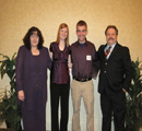 Tamara & Jimmie Johnson present awards to Stacy Littlechild & Gage Brummer