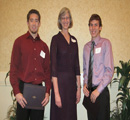 Loretta Hoerman presents awards to Kyle Steuber & Corey Wells