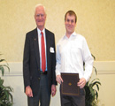 Ken McCosh presents award to Theodore Budden