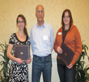 Council member Albert Perry presents awards to Chloe Callahan & Angela Grommet