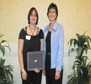 Cindy Sorrick presents award to Kristina Bigelow