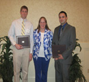 Jacob Hull & Jimmie Stewart receive award from Charlene Redman.