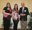 Rachel Nichols & Victoria Davidson receive awards from Harvey McCarter.