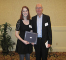 Jessica Long receives award from Dr. Lincoln Deihl.