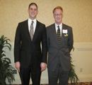 Geoffrey DiGiacinto receives an award from council member Jack Ryan.