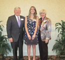 Jordan Parker receives award from Drs. Mike & Elaine Jacobson (council)