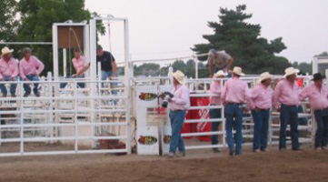 cowboys dressed in pink